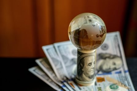 transparent-globe-on-dollars-2025-01-08-20-40-44-utc